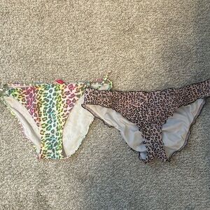 2 animal print neon and pink bikini bottoms